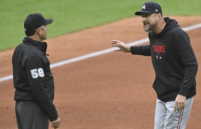 Minnesota Twins manager Rocco Baldelli (5) argues with third base umpire Dan Iassogna (58). (David Richard-USA TODAY Sports)